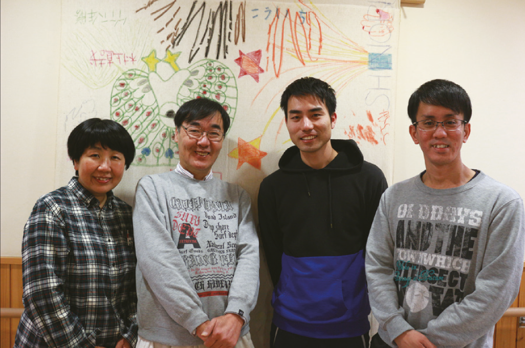 Director Ms. Watanabe (left) along with staff