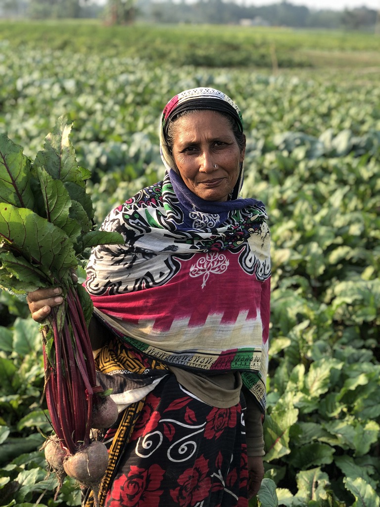 Happy farmer with their harvested beets